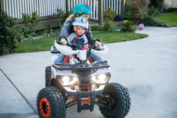 istock Brother and Sister on a Quad ATV 1308400979