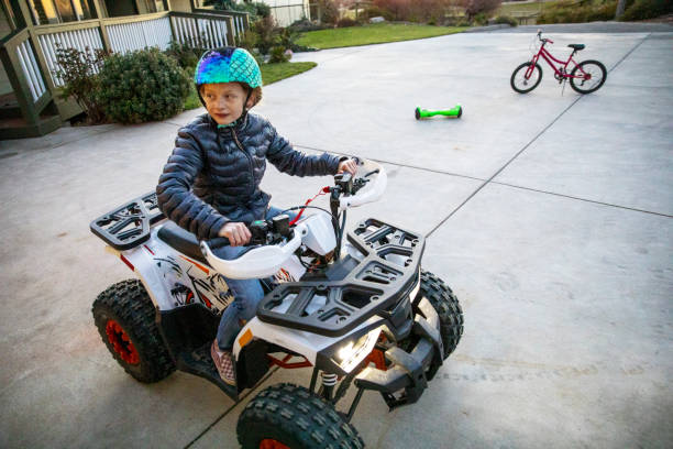 istock Girl Riding a Quad 1308401788