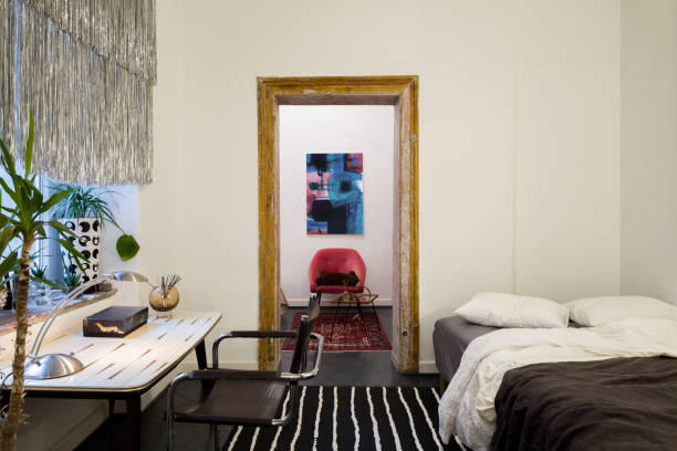 istock Eclectic bedroom with desk 1308402350