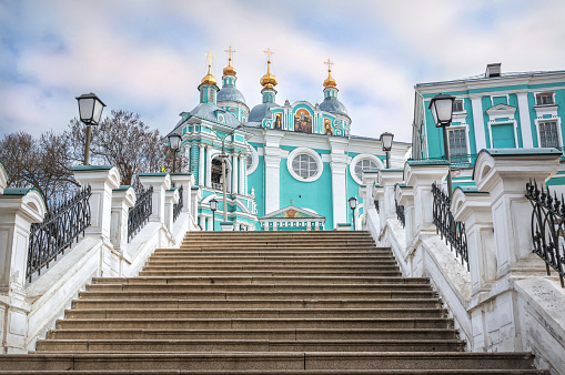 Assumption Cathedral and the stairs to it in Smolensk under the blue spring sky