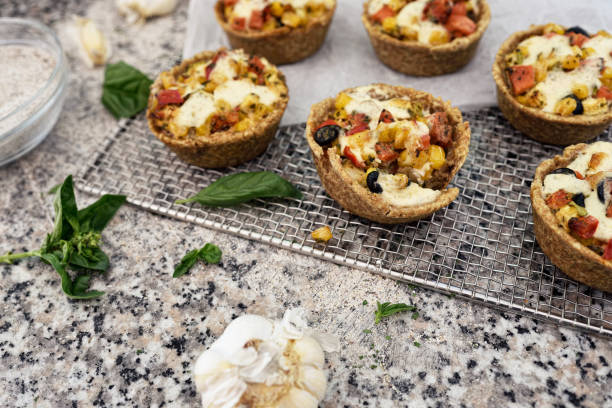 istock Healthy delicious egg bacon vegetable muffins. 1308404739