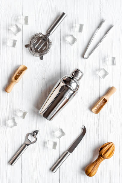 istock Cocktail bar utensils and tools with shaker, strainer and ice 1308407068