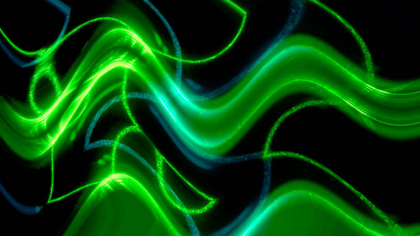 istock Close-up of abstract green illuminated wave pattern 1308413671