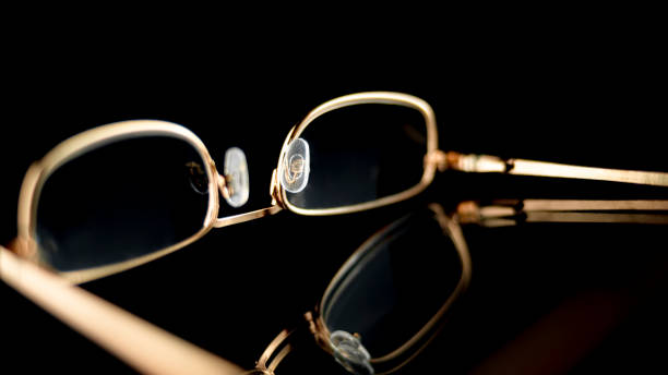 istock Close-up of gold coloured spectacles 1308413686