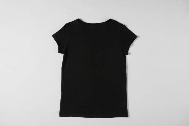istock Black T-shirt on grey background 1308415010