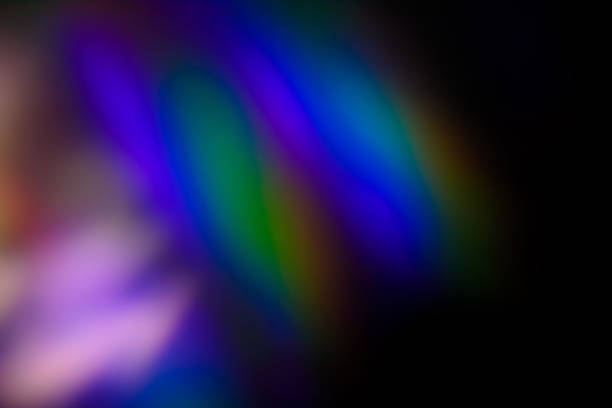 istock colorful warm rainbow light leaks on black background with dust texture 1308415101