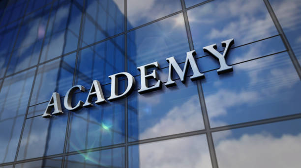 istock Academy glass skyscraper with mirrored sky 3d illustration 1308416014