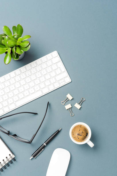 istock Overhead shot of office table with accessories 1308416378