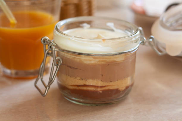 istock Dessert three chocolates in a jar and juice 1308417620