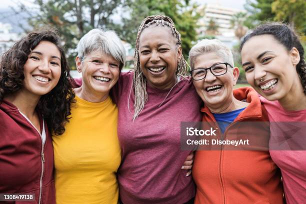 Happy Multi Generational Women Having Fun Together Multiracial Friends Smiling On Camera After Sport Workout Outdoor Main Focus On African Female Face Stock Photo - Download Image Now