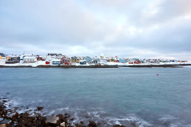 istock the beautiful beach in winter with snow and clouds 1308421669