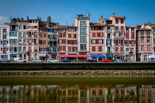 Traditional facades with colorful windows in Bayonne, France