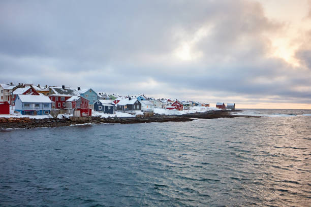 istock the beautiful beach in winter with snow and clouds 1308421729