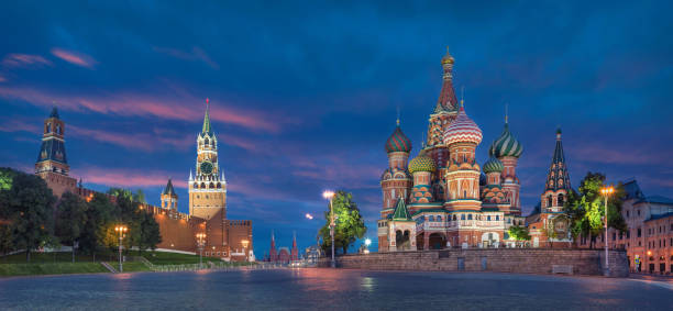 Moscow, Russia. HDR panorama of Red Square Moscow, Russia. HDR panorama of Red Square with Saint Basil Cathedral and Spasskaya Tower at dusk moscow stock pictures, royalty-free photos & images