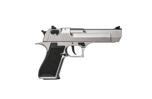 istock Modern semi-automatic silver pistol isolate on a white background. Armament for the army and police. Short-barreled weapon. 1308426069