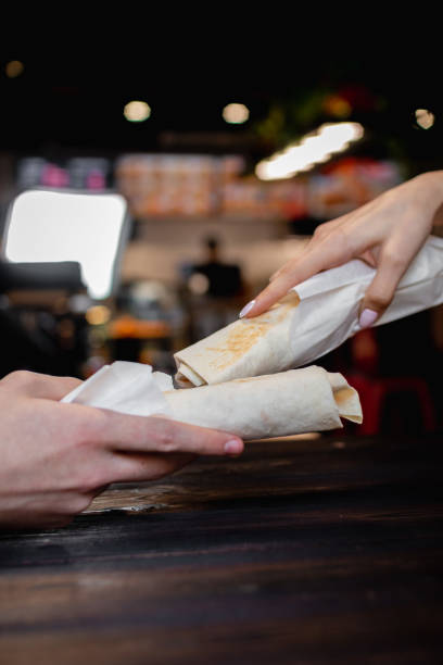 istock Hands holding shawarma. Fast Food Concept 1308428458
