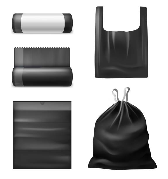Realistic black trash bags. Kitchen garbage plastic sacks, bag with handles, collapsed and expanded, roll with blank empty label, filled with household waste vector 3d isolated set Realistic black trash bags. Kitchen garbage plastic sacks, bag with handles, collapsed and expanded, roll with blank empty label, filled with household waste vector 3d isolated on white background set garbage bag stock illustrations