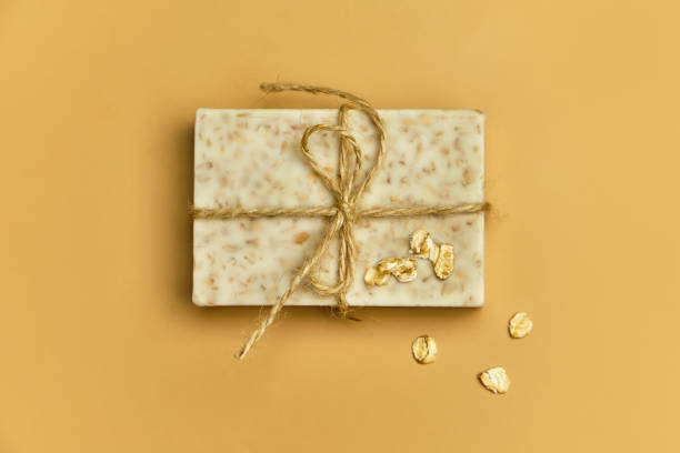 istock Handmade bath oat soap on beige background. 1308431592