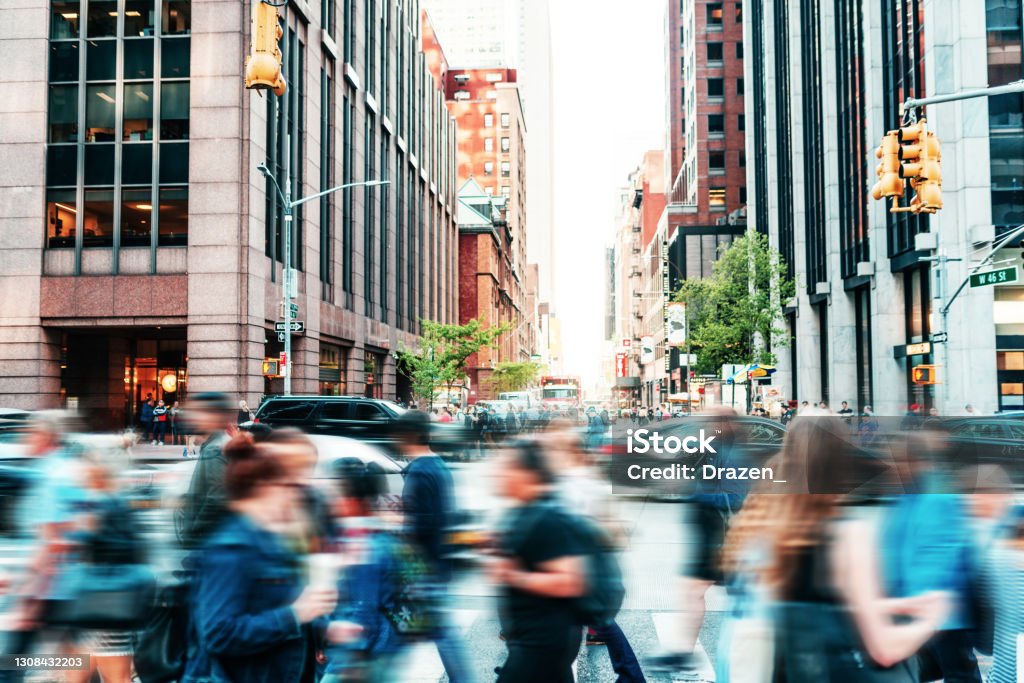 Crowded street with people in New York in springtime Crowded street with people in New York People Stock Photo