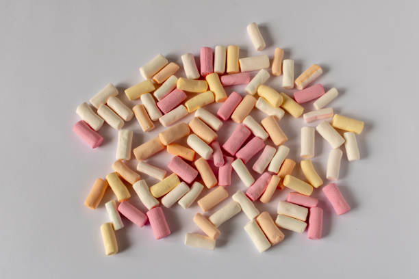 istock Colorful marshmallows on a light background. Close-up. Selective focus. 1308433859