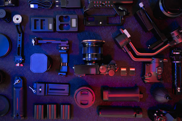 istock top view of work space photographer with digital camera, Gimbal Stabilizers and camera accessory 1308434132