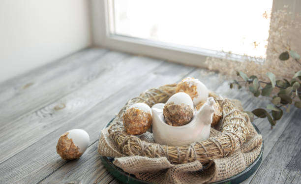 istock Easter composition with festive eggs in a decorative nest copy space. 1308436266