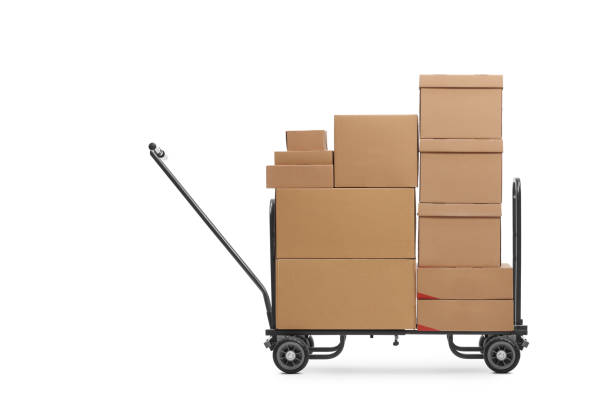 istock Studio shot of a hand truck loaded with cardboard boxes 1308437109
