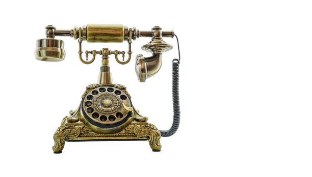 istock Closeup view of plain old retro telephone isolated on white background 1308438920