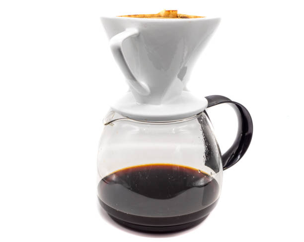 istock Coffee pot with filter isolated on white background 1308440038