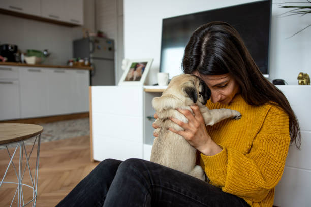 Sad young woman with her little dog