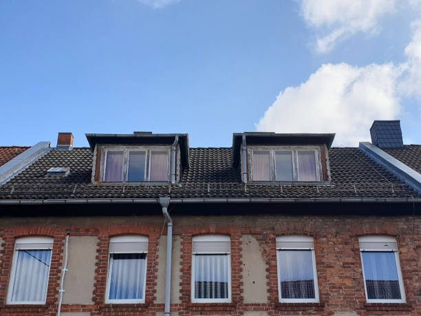istock Old roof with old windows 1308442766