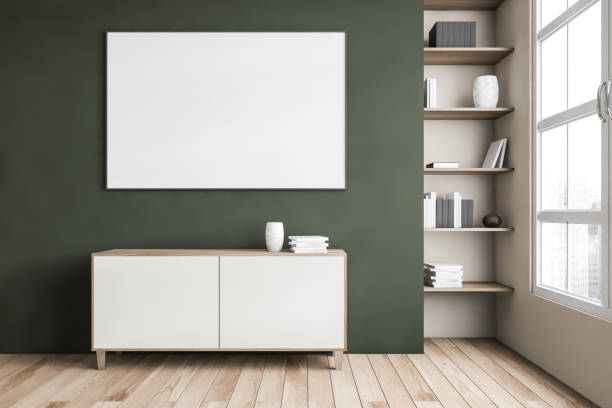 istock Mockup canvas above commode, green wall and bookshelf near window 1308446573