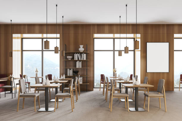 istock Cafe with mockup frame, wooden table and chairs, restaurant with window 1308446968