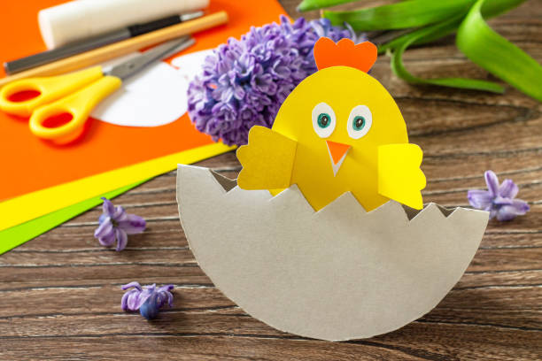 istock Paper Easter egg gift with a chicken. Easter handmade Project of children's creativity, handicrafts, crafts for kids. 1308448575