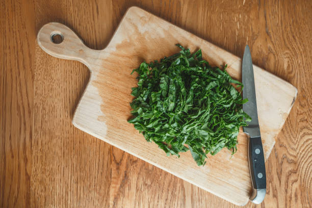 istock Cut sorrel leaves and a knife 1308448829