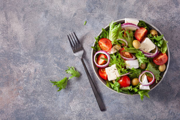 istock tomato salad with brie cheese olives onion lettuce 1308449632