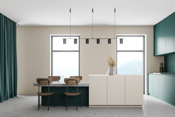 istock White and ocean green modern kitchen interior near window. Dining area with table. Concrete floor. Tall window. 1308450672