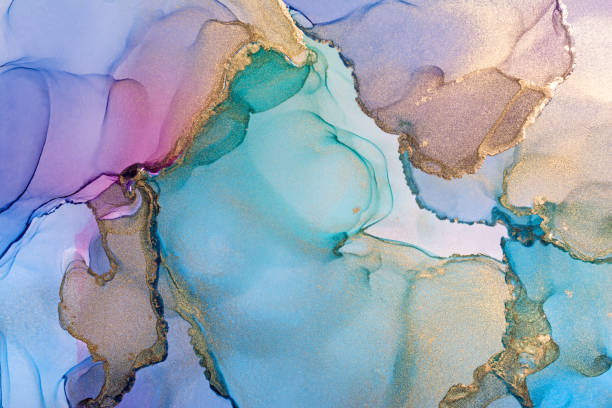 istock Multicolor with shiny golden alcohol ink abstract textured background 1308451837