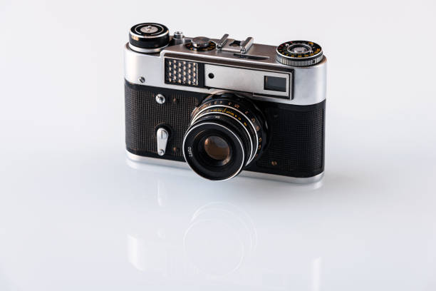 istock Retro film photo camera, old vintage camera 1308452064
