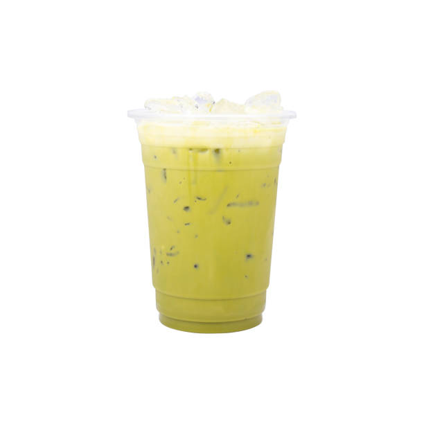 istock Matcha green tea with milk on plastic cup isolated white background 1308454657