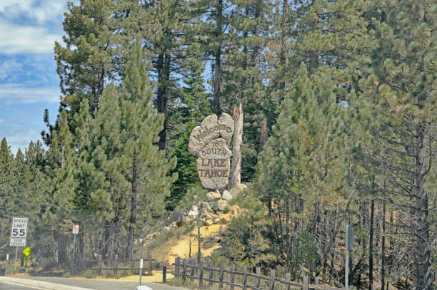 South Lake Tahoe, California - USA: This carved sign welcomes the visitor to South Lake Tahoe the sign is visible to the travelers on highway 50 and on this August day it looks very welcoming.