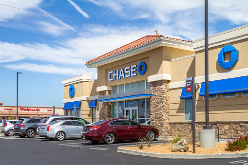 Apple Valley, CA, USA – March 17, 2021: Parking lot view of the Chase bank building at Jess Ranch in the Town of Apple Valley, California.