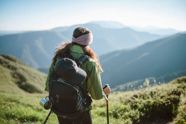 istock Young woman exploring the mountain. 1308459270