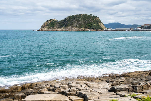 Cantabrian Sea island of San Anton, village of Getaria, Basque coast of Gipuzkoa, Spain Cantabrian Sea island of San Anton, village of Getaria, Basque coast of Gipuzkoa in Spain getaria stock pictures, royalty-free photos & images