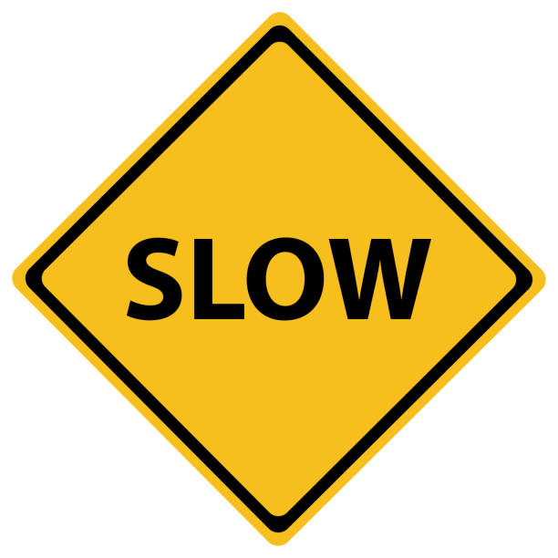 желтый дорожный знак медленный - медленный stock illustrations