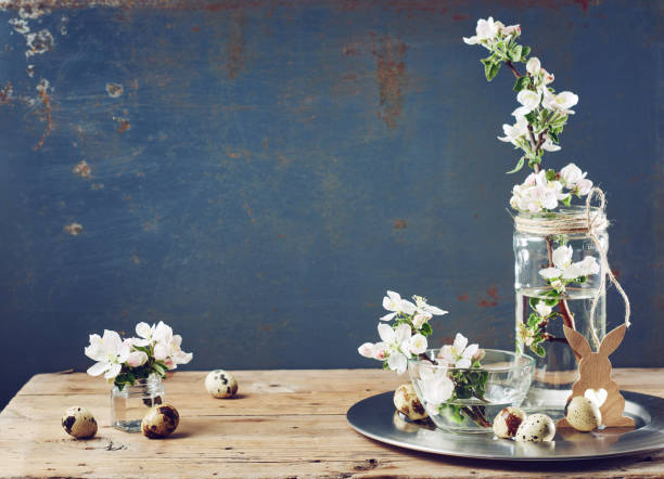 istock Apple blossom flowers and quail eggs. 1308466630