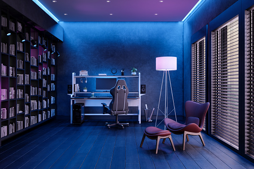 Games Room At Night With Neon Light Gaming Chair Bookshelf And Floor Lamp  In The Room Stock Photo - Download Image Now - iStock