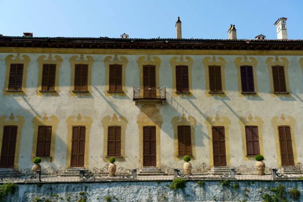 Robecco sul Naviglio, Italy - August 1, 2020: Bicycle path along the Naviglio Grande from Abbiategrasso to Turbigo (Lombardy, Italy), at Robecco sul Naviglio: Villa Gaia