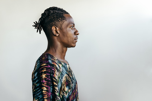 Portrait of a black man with braids