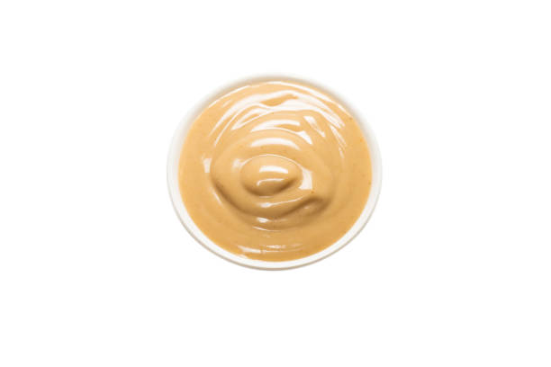 istock Mushroom sauce in a bowl isolated on white background. 1308475199